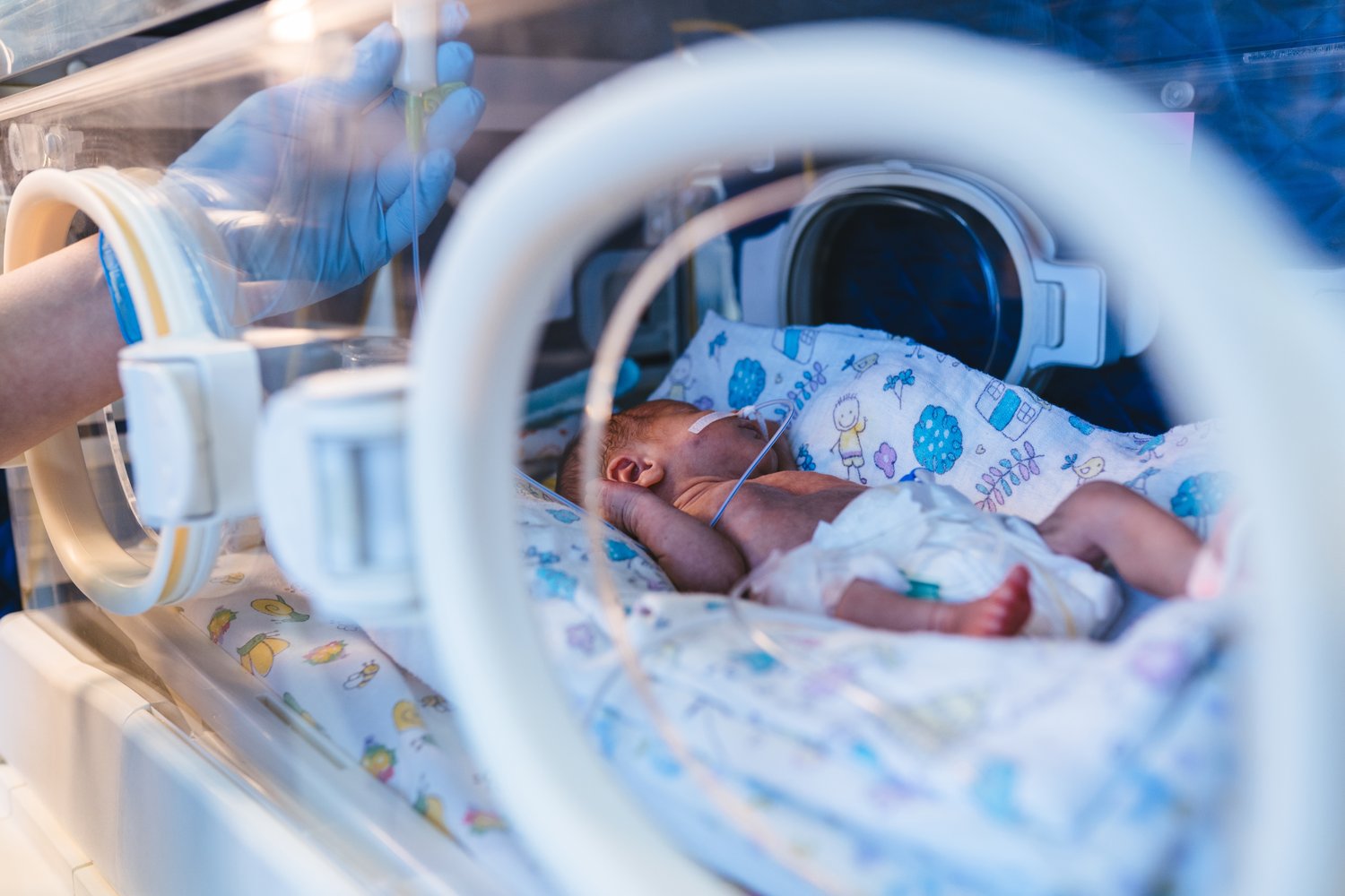 Hospital care setting suggesting intensive care for infants and families.