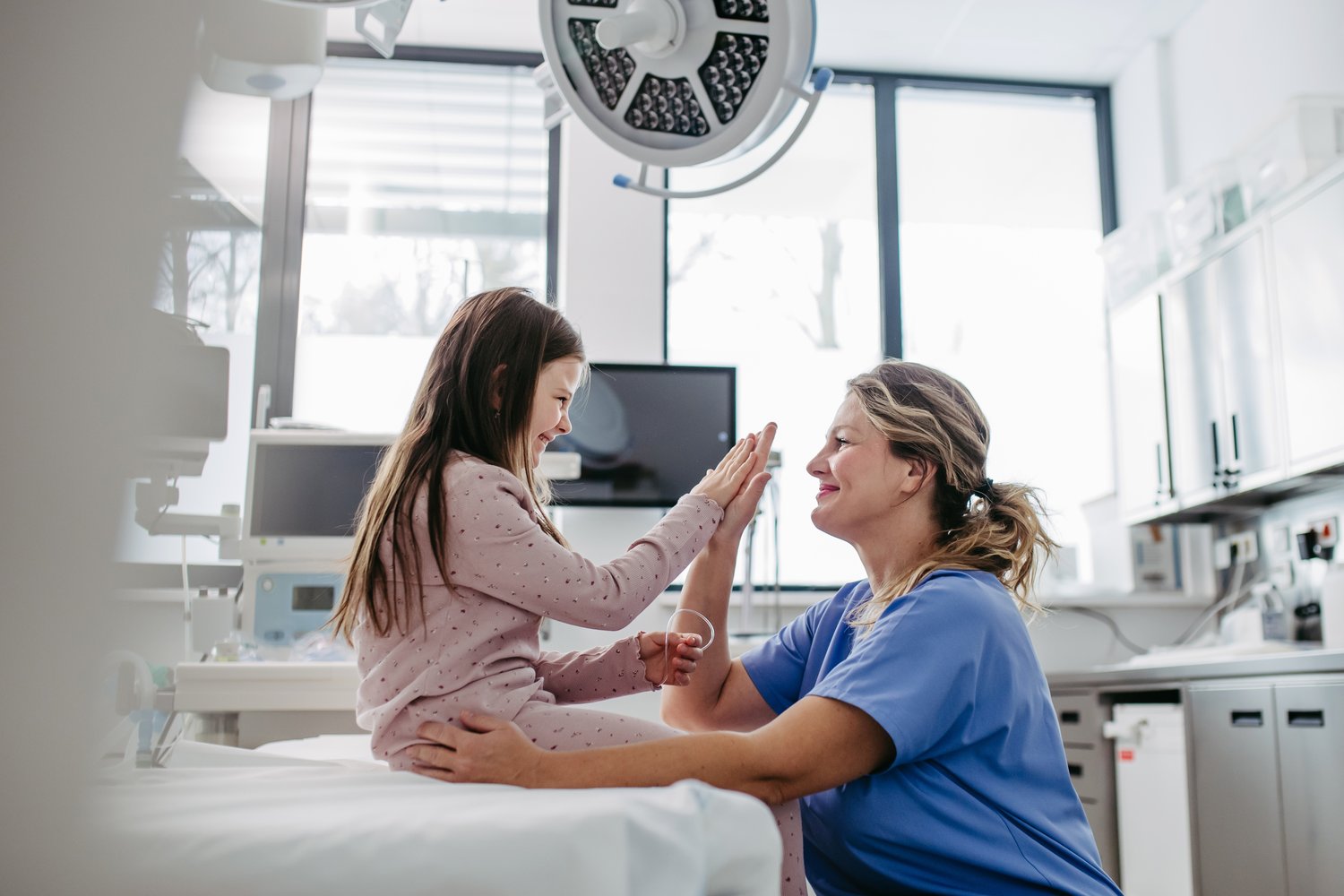 Child in a warm everyday moment, representing pediatric and longitudinal care.